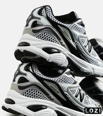 کفش کتانی مردانه و زنانه طوسی مشکی سفید NEW BALANCE 1064 V.2