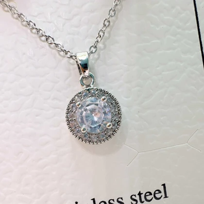 نیم‌ست استیل نقره‌ای طرح «خورشیدی گرد» (گردنبند + گوشواره) | اقتصادی و درخشان