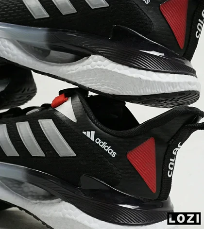 کفش کتانی زنانه مشکی سفید Adidas solar disk