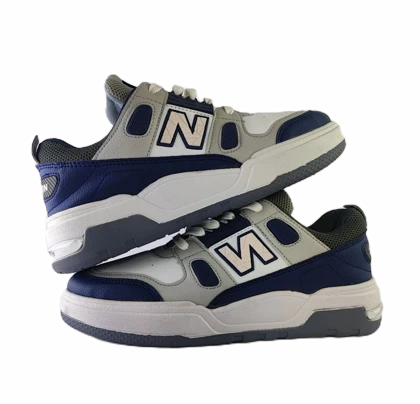 کفش ونس مردانه برند نیوبالانس new balance مدل دیما سفید سورمه‌ای کد 192