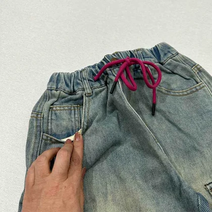 شلوار جین سنگ شور شده مام 6 جیب بند صورتی