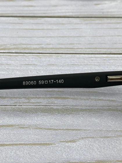 خرید عینک آفتابی پرادا مردانه فریم کائوچو با عدسی پلی‌کربنات UV400 پلاریزه مخصوص رانندگی