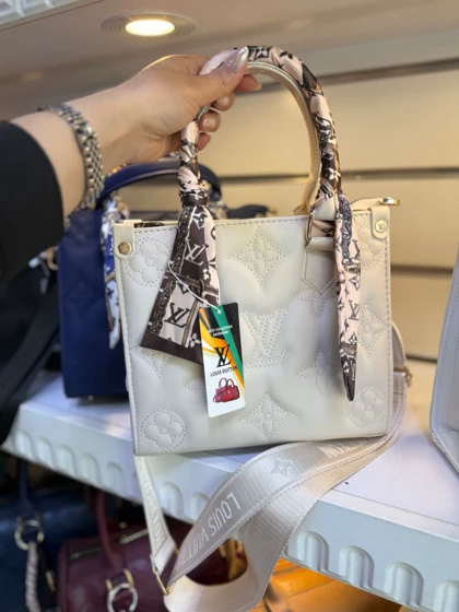 کیف زنانه و دخترانه LV چرم وارداتی
