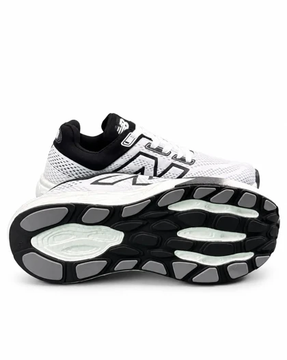 کفش کتانی رانینگ مردانه نیوبالانس زیره بست سفید مشکی New BALANCE