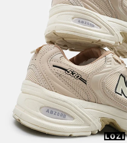 کفش کتانی مردانه و زنانه کرم NEW BALANCE 530