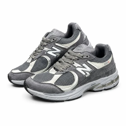 کتانی مردانه مدل نیوبالانس 2002 طوسی کرم New Balance