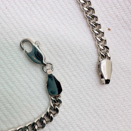 دستبند ژوپینگ طرح کارتیه (کوبان) نقره‌ای | آبکاری رادیوم و رنگ ثابت