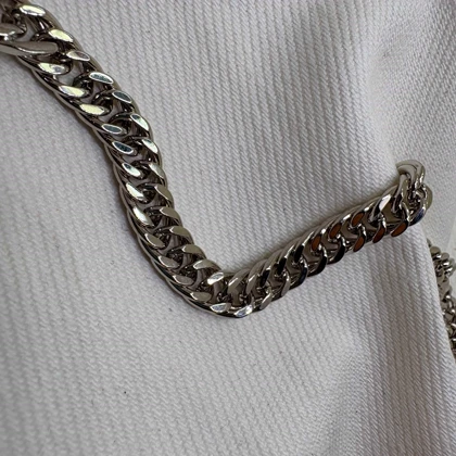 دستبند ژوپینگ طرح کارتیه (کوبان) نقره‌ای با قفل کتابی | یونیسکس