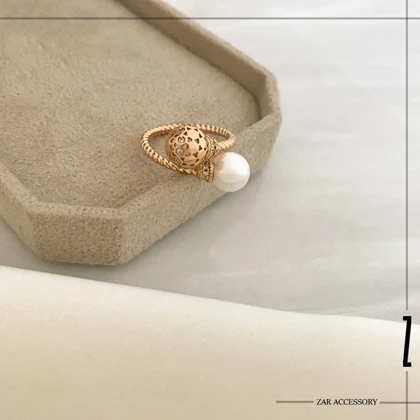 انگشتر کاف مروارید و گوی مشبک