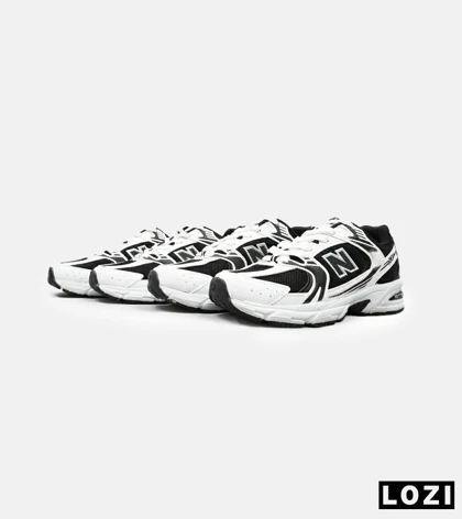 کفش کتانی مردانه و زنانه سفید مشکی NEW BALANCE 530