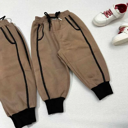 شلوار جاگر دورس لاینردار طرح MM لبخند