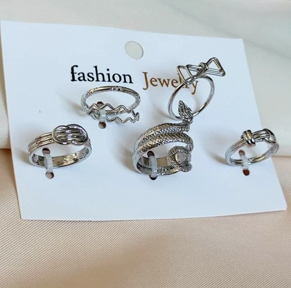 ست 4 تایی انگشتر فشن نقره‌ای مدل آویز و طرح مار (Snake Ring) و گره - ترند 2025