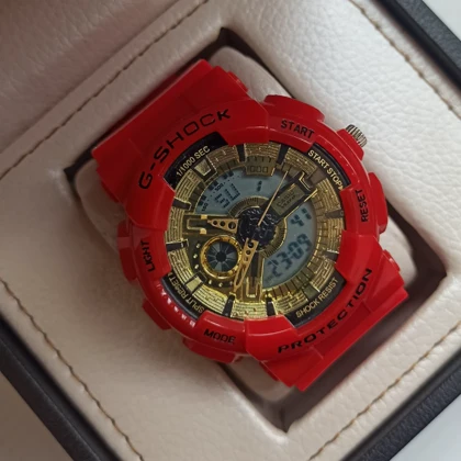 ساعت مچی اسپرت طرح جیشاک 110 رنگ قرمز صفحه طلایی