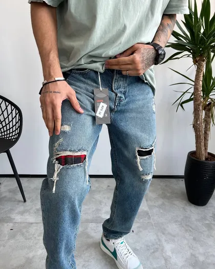 شلوار مام فیت رنگ خاص زاپ‌دار LEVIS