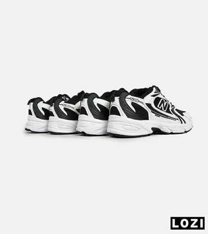 کفش کتانی مردانه و زنانه سفید مشکی NEW BALANCE 530