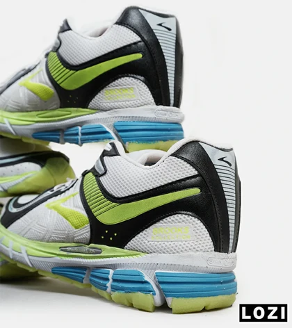 کفش کتانی بزرگ پا سفید مشکی لیمویی BROOKS adrenaline gts 22