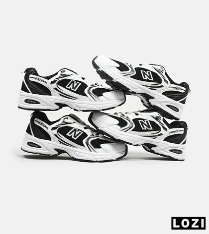 کفش کتانی مردانه و زنانه سفید مشکی NEW BALANCE 530