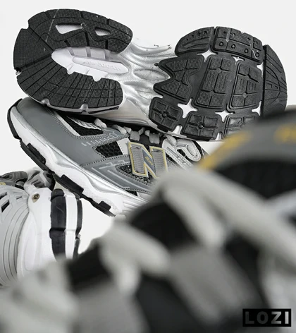 کفش کتانی مردانه و زنانه طوسی مشکی New Balance 1906R مدل 7363