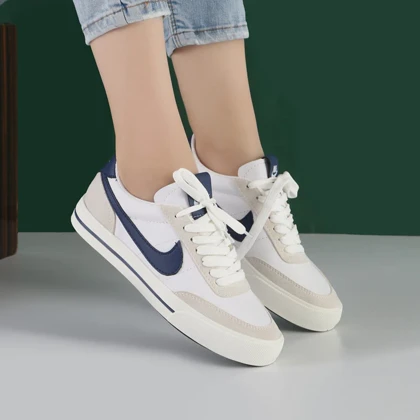 کفش و کتانی زنانه رنگ سفید سرمه ای مدل نایک NIKE کد M209