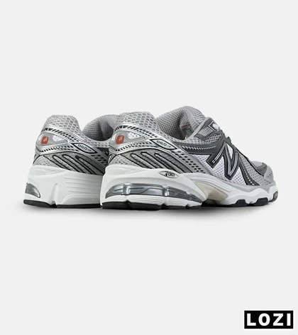 کفش کتانی بزرگ پا سفید طوسی New Balance 860 V.02 مدل 7524