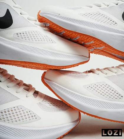 کفش کتانی مردانه سفید نارنجی Nike guide 10