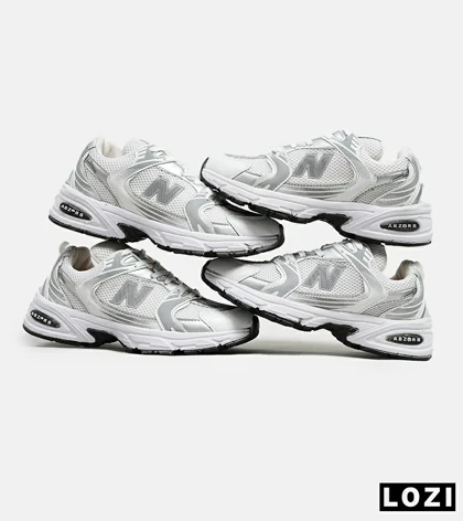 کفش کتانی مردانه و زنانه سفید طوسی نقره ای NEW BALANCE 530