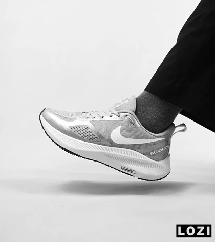 کفش کتانی زنانه و مردانه طوسی Nike guide 10