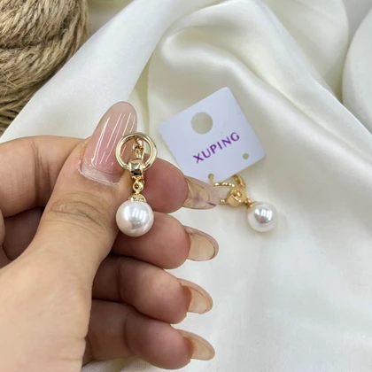 گوشواره زنانه مدل صدف آویز مروارید ژوپینگ رنگ طلایی