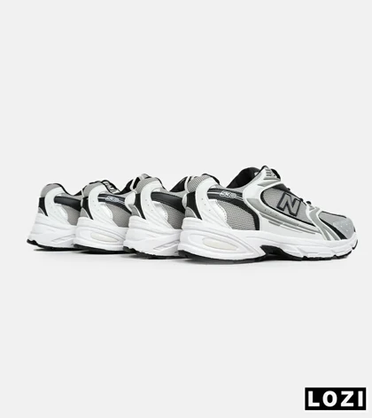 کفش کتانی مردانه و زنانه سفید طوسی مشکی NEW BALANCE 530 مدل 6642