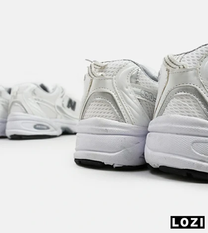 کفش کتانی مردانه و زنانه سفید طوسی NEW BALANCE 530