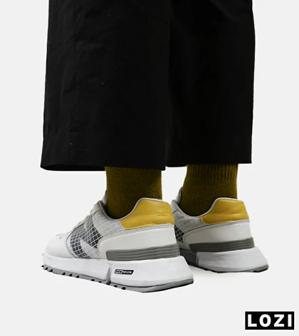 کفش کتانی سفید طوسی زرد NEW BALANCE 1300