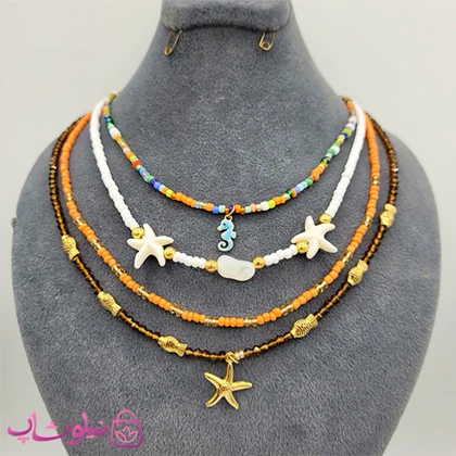 گردنبند دخترانه دستساز 4 لاین مدل ستاره دریایی تناژ نارنجی کد 560