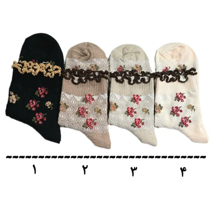 جوراب ساق بلند سوزنی طرح گل های برجسته