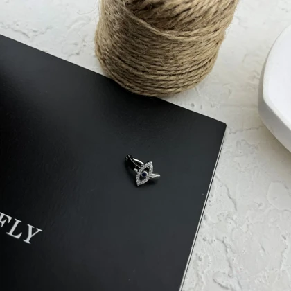 پیرسینگ ناف استیل طرح چشم جواهری