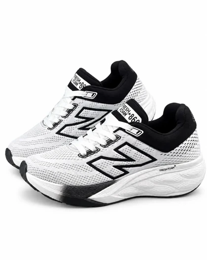کفش کتانی رانینگ مردانه نیوبالانس زیره بست سفید مشکی New BALANCE