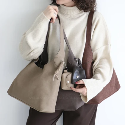 کیف زنانه بزرگ جیر مدل سیمبل