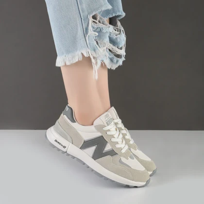 کفش و کتانی زنانه و دخترانه مدل نیوبالانس NEWBALANCE رنگ طوسی کد M672