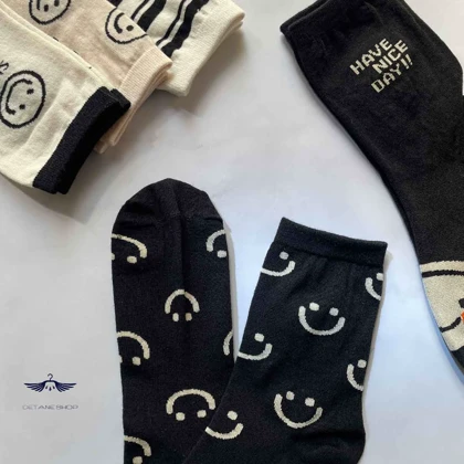 جوراب ساق‌دار سفید و مشکی طرح لبخند مستر ساکس