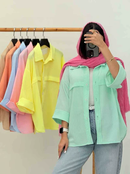 مانتو برش‌دار سر آستین دکمه