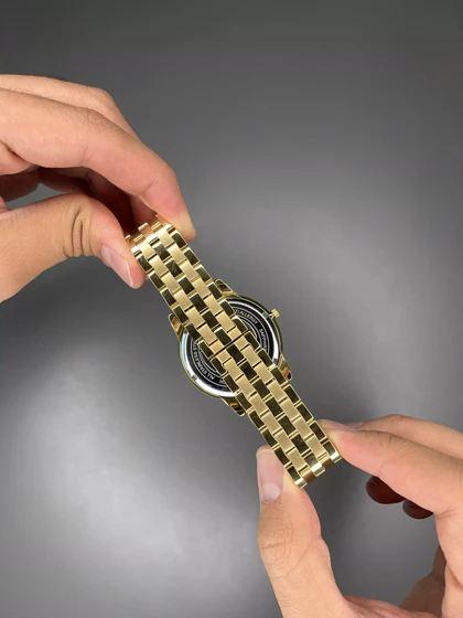 ساعت مچی رومانسون کوارتز بند طلایی صفحه مشکی Romanson Quartz