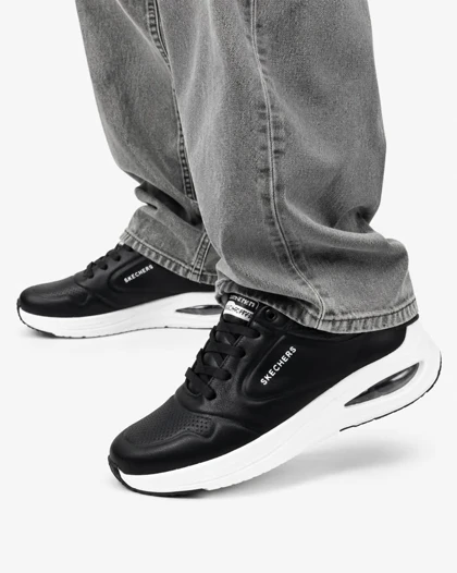 کفش کتانی رانینگ مردانه اسکیچرز زیره کپسولی مشکی سفید SKECHERS