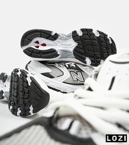 کفش کتانی مردانه و زنانه سفید خاکستری NEW BALANCE 530 مدل 4073