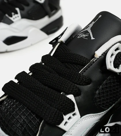 کتانی ساق‌دار بزرگ پا سفید مشکی Nike air jordan 4