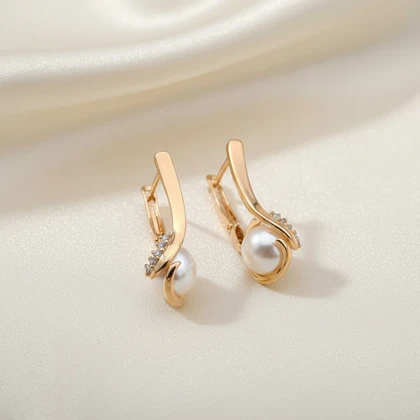 گوشواره ژوپینگ مرواریدی نگین‌دار طرح موج طلایی