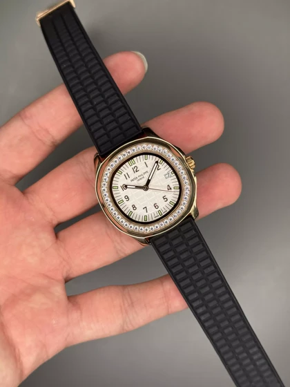 ساعت مچی پتک فیلیپ زنانه بند مشکی قاب رزگلد دورنگین Patek Philippe Nautilus