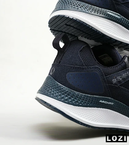 کفش کتانی طبی زنانه و مردانه سرمه ای SKECHERS archfit v02