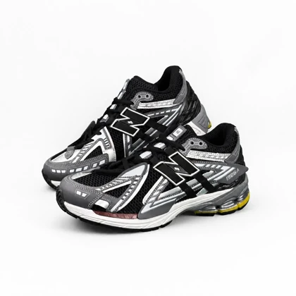 کفش کتانی مردانه نیوبالانس 1906طوسی سفید مشکی New BALANCE 1906