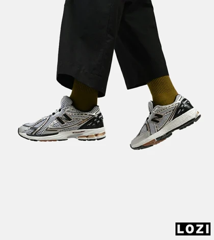 کفش کتانی سفید سرمه ای Newbalance 1906R