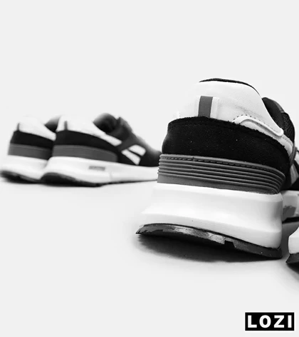 کفش کتانی مشکی سفید REEBOK Unphased Pro مدل 5172