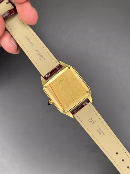 ساعت مچی کارتیه دومونت بند چرمی قهوه ای قاب طلایی Cartier